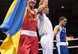 Василий Ломаченко на Олимпийских играх 2008 в Пекине празднует победу в финале над Хедафи Джелхиром