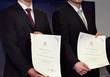 Владимир и Виталий Кличко с дипломами "Чемпионы спорта ЮНЕСКО"