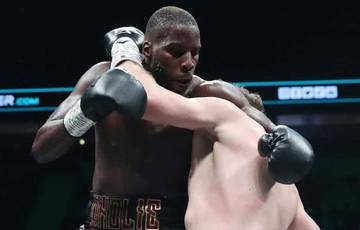 Okolie's trainer compared the habit of clinching to smoking
