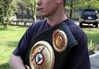 Юрий Нужненко с поясом Интреконтинентального чемпиона WBA
