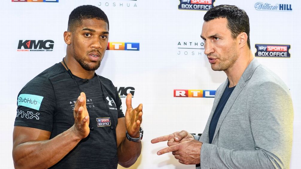 Anthony Joshua, left, and Wladimir Klitschko, right, face off before fighting on April 29.