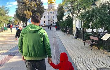 Usyk brings his son to church