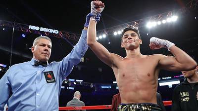 Garcia stops Lopez in two