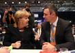 Виталий Кличко в качестве политика беседует с немецким канцлером Ангелой Меркель на Конвенции федеральной партии Христианско-демократического союза в декабре 2012 года в Германии