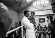 Мухаммед Али в Лондоне накануне поединка против Генри Купера с 8-месячной Марией Морин на открытой тренировке, май 1963