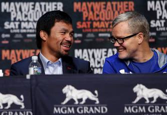 Roach: Pacquiao could just call