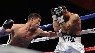 Dmitry Bivol dominates Samuel Clarkson to easily retain interim light heavyweight title