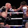 Warrington stops Martinez in rematch