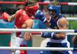 Матвей Коробов в поединке против шведского боксера Наима Тербуньи на Олимпийских играх 2008 в Пекине