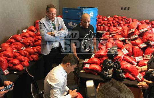 Gennady Golovkin Signs Hundreds of Boxing Gloves for Canelo Fight VIPs