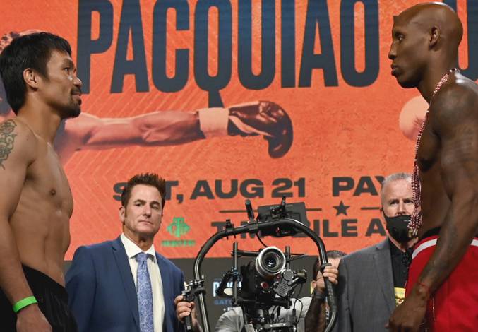 Pacquiao and Ugas make weight