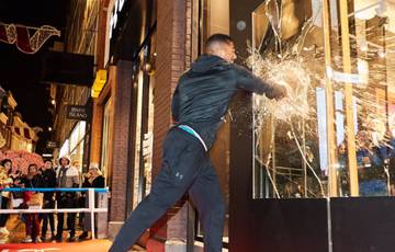 Joshua broke the shop window in the center of Amsterdam