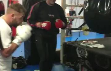 Fury and Saunders working on one bag