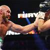 Fury defeats Wallin in a bloody battle