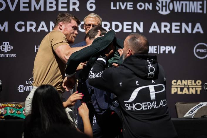 Plant gets a cut during his press conference scuffle with Alvarez