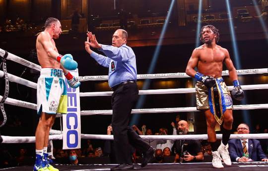 Russell stopped Postol in the tenth round