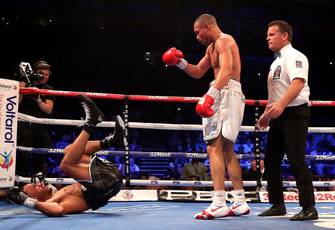 Eubank Jr. beats up, decisions DeGale