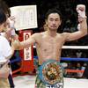 Yamanaka keeps WBC bantam belt by halting Carson in seven