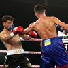 Postol Gains Hard Fought Win over Najmiddinov