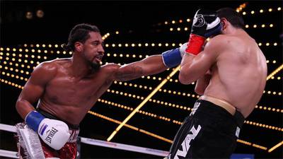 Andrade stops Akavov