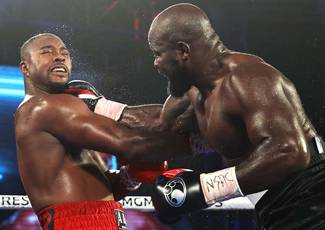 Takam defeats Forrest on points