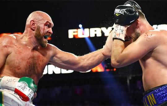 Fury defeats Wallin in a bloody battle