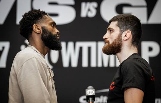 Ennis and Chukhajian at the final press conference