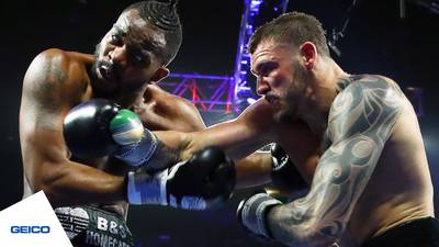 Smith knocks Hart down and wins on points