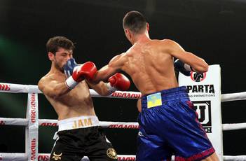 Postol Gains Hard Fought Win over Najmiddinov