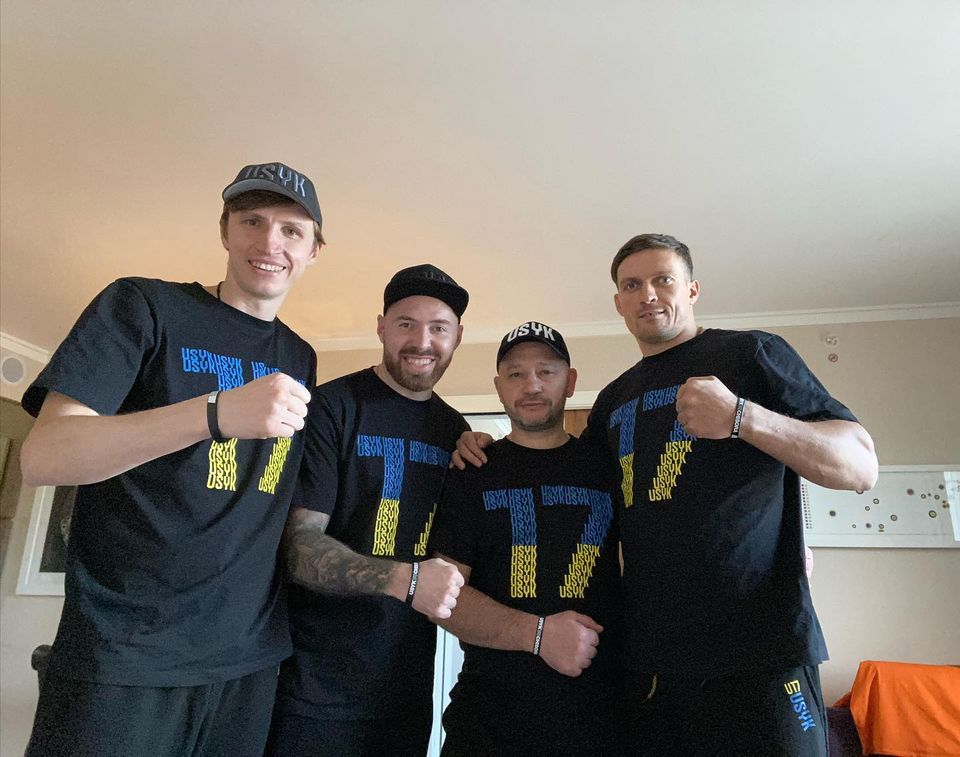 Alexander Usyk with his team