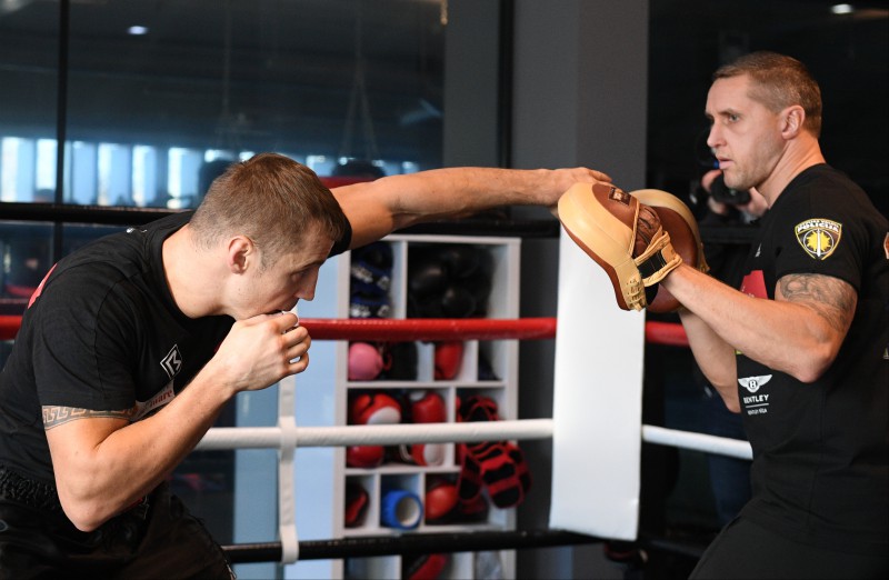 Mairis Briedis with his coach Sandis Klein