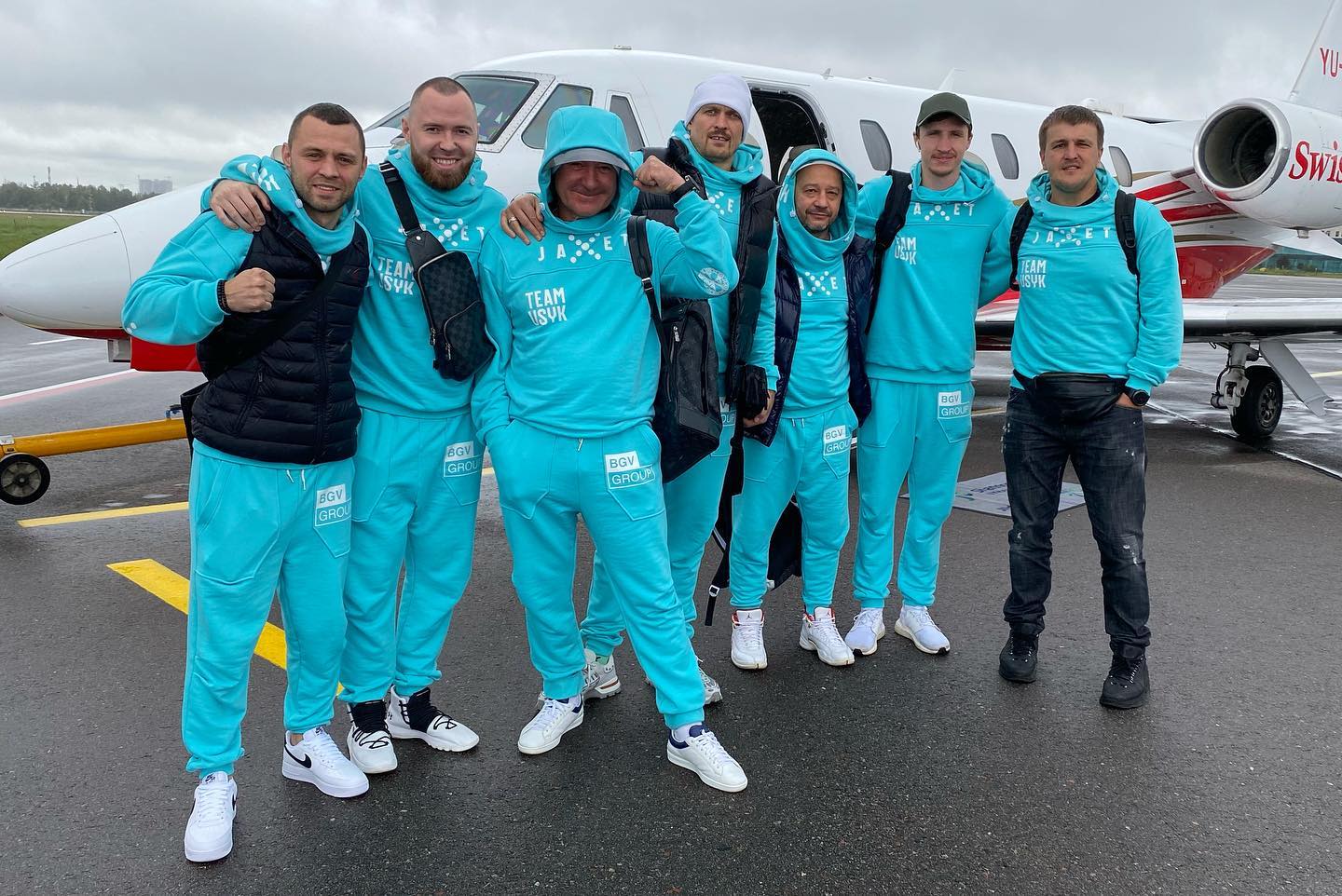 Alexander Usyk and his team on their way to London