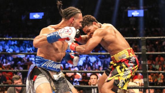 With a win against longtime friend Andre Berto on April 22, Shawn Porter, right, could earn a rematch of his close decision loss to Keith Thurman, left, in their welterweight title fight last June