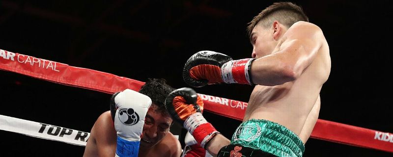 Irish Olympic star Michael Conlan, right, improved to 2-0 after knocking out Alfredo Chanez in the third round Friday night