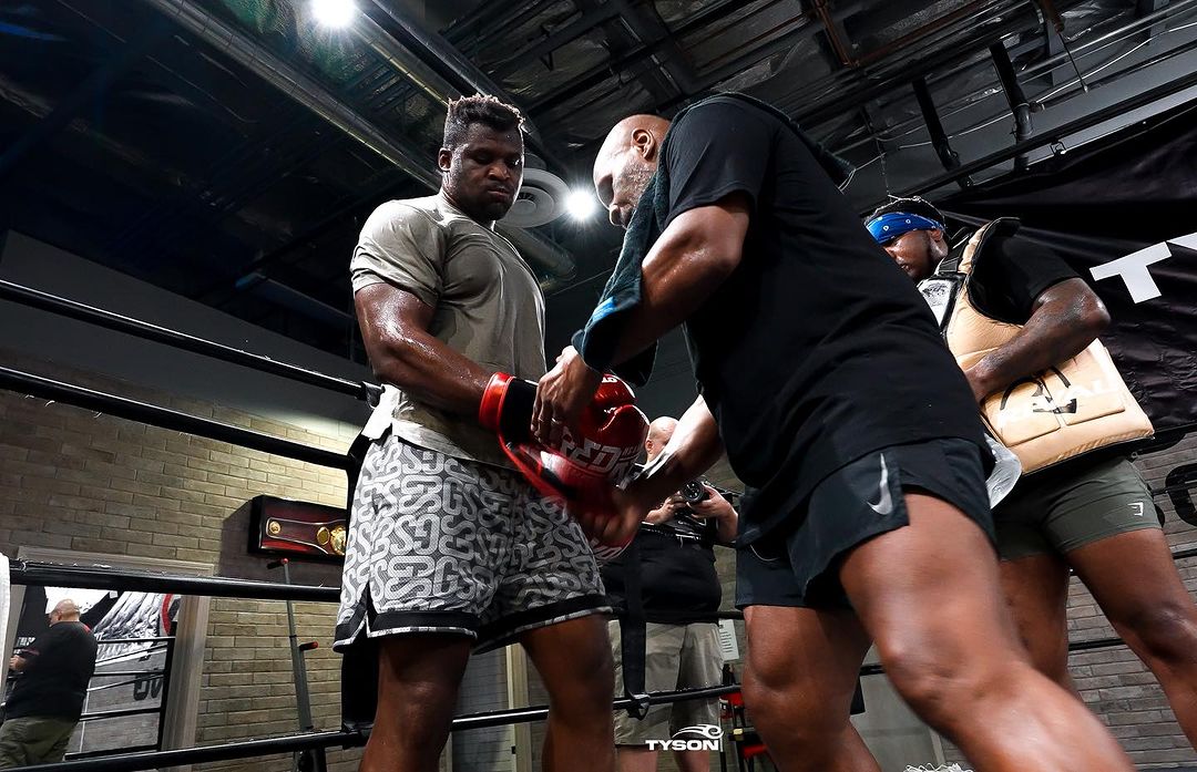 Francis Ngannou and Mike Tyson