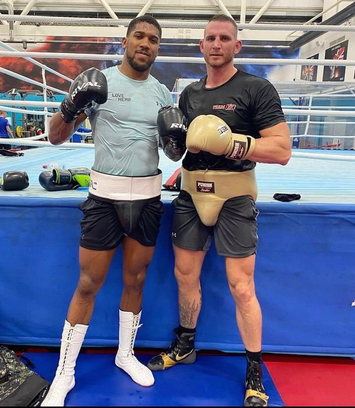 Anthony Joshua and Demsey McKean