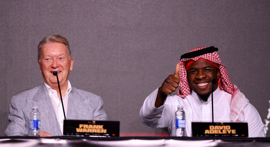Frank Warren and David Adeleye in Saudi Arabia. Getty Images