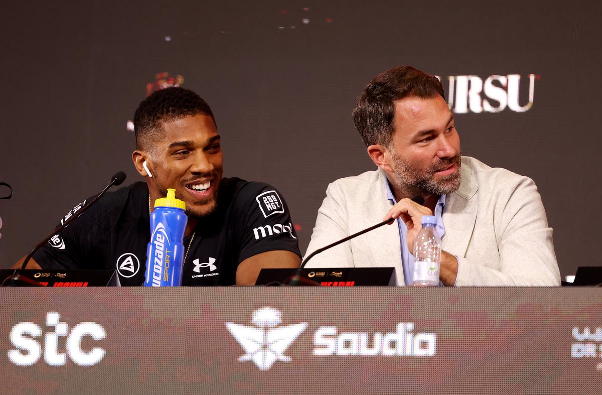 Anthony Joshua and Eddie Hearn. Getty Images