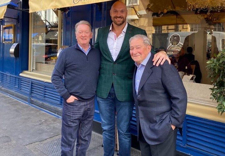 Tyson Fury with his promoters