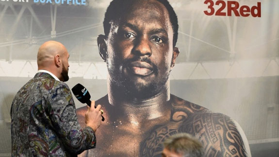 Tyson Fury and Dillian Whyte's image at a press conference