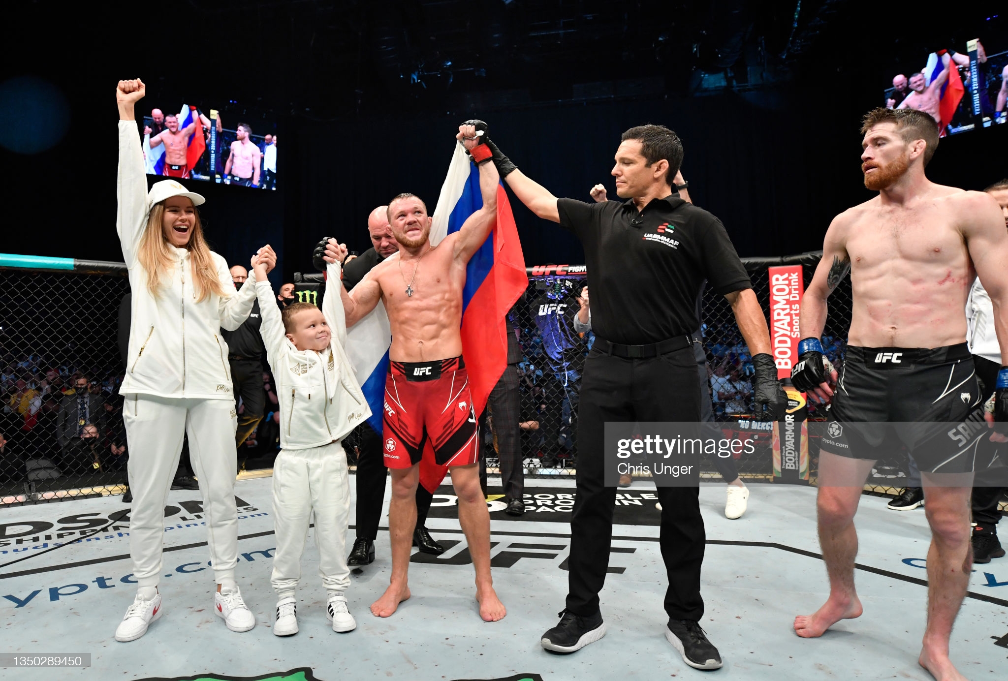 Petr Yan celebrates his victory over Cory Sandhagen with his family