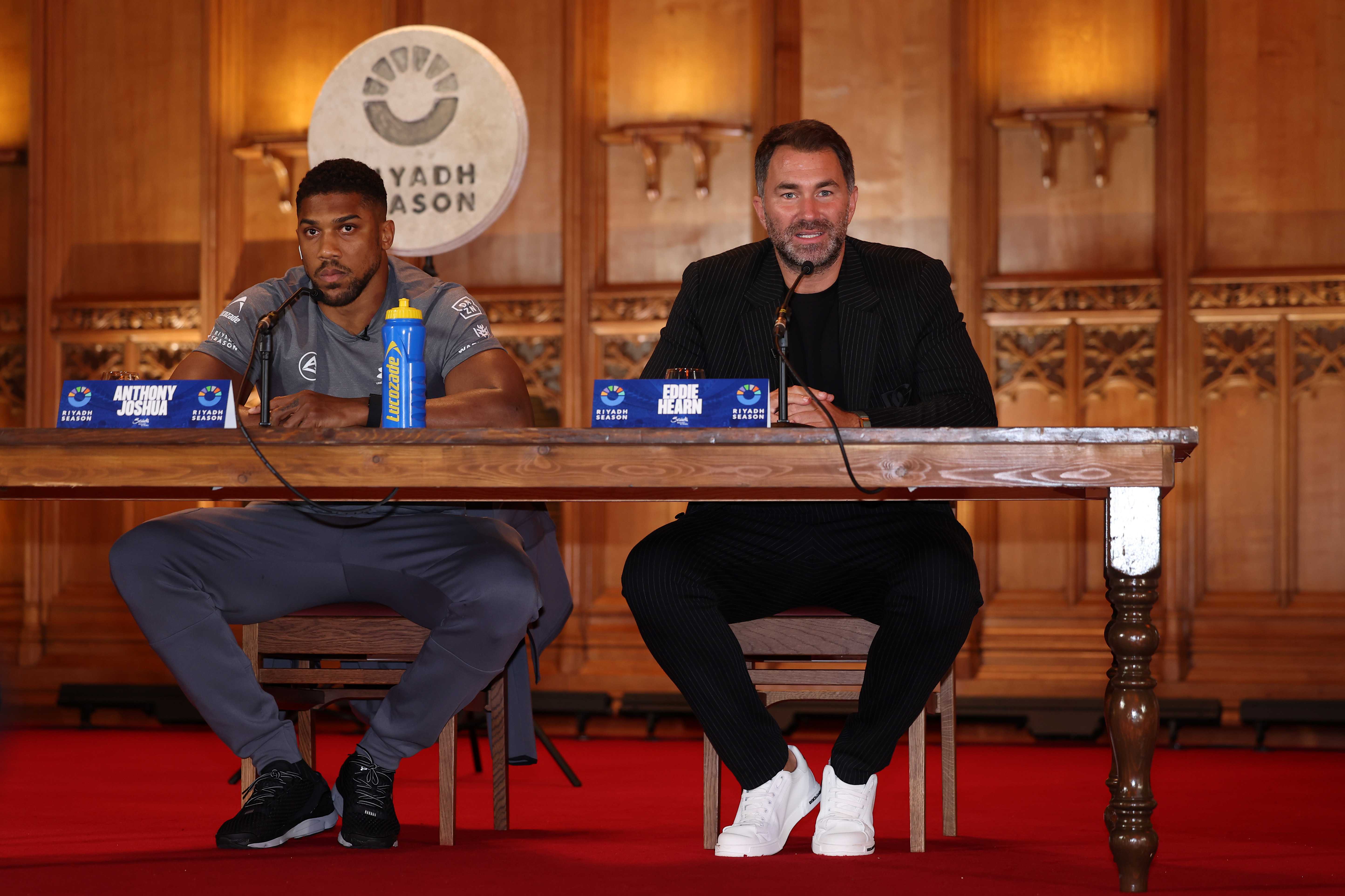 Anthony Joshua and Eddie Hearn. Getty Images