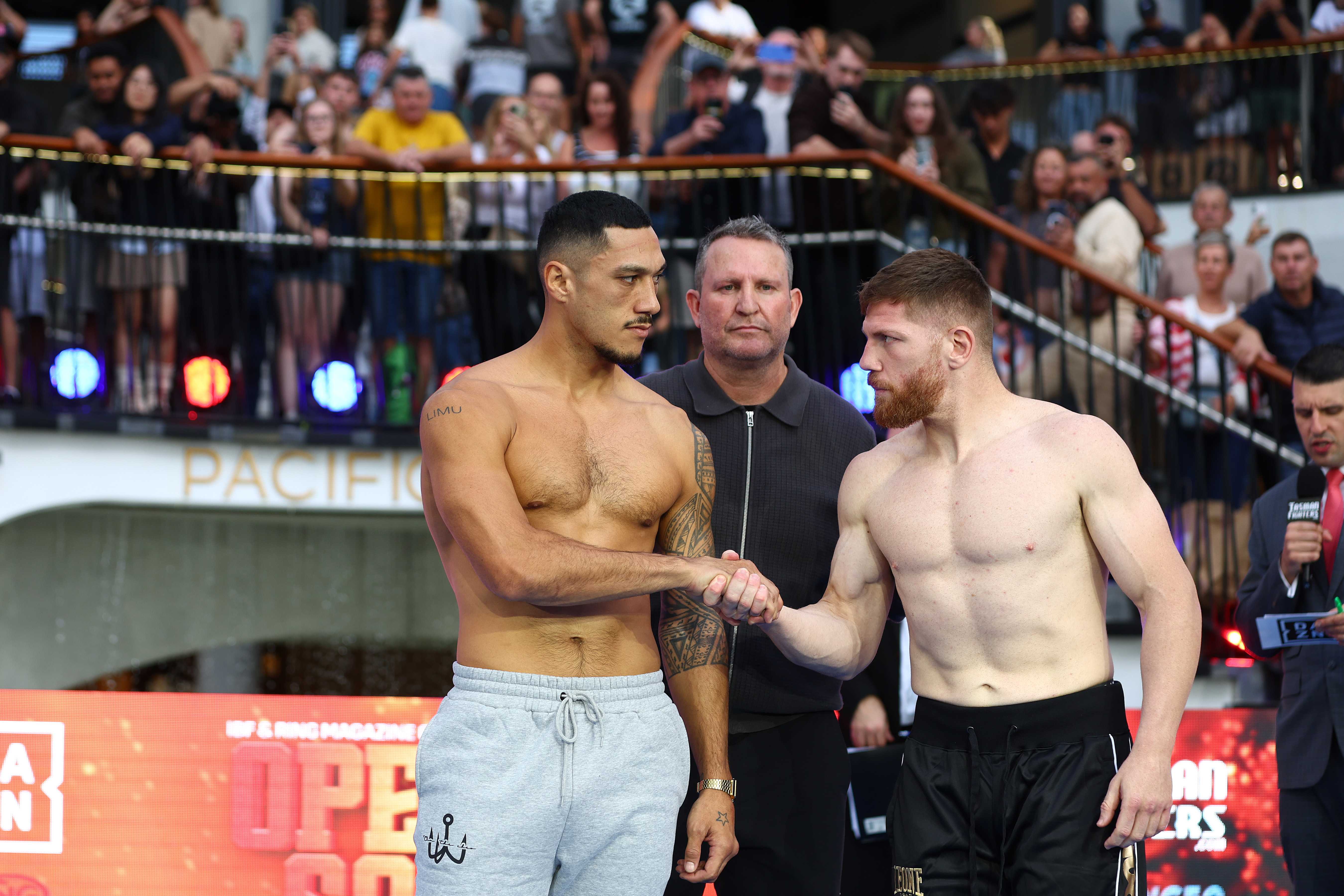 Jai Opetaia and Claudio Squeo. Getty Images